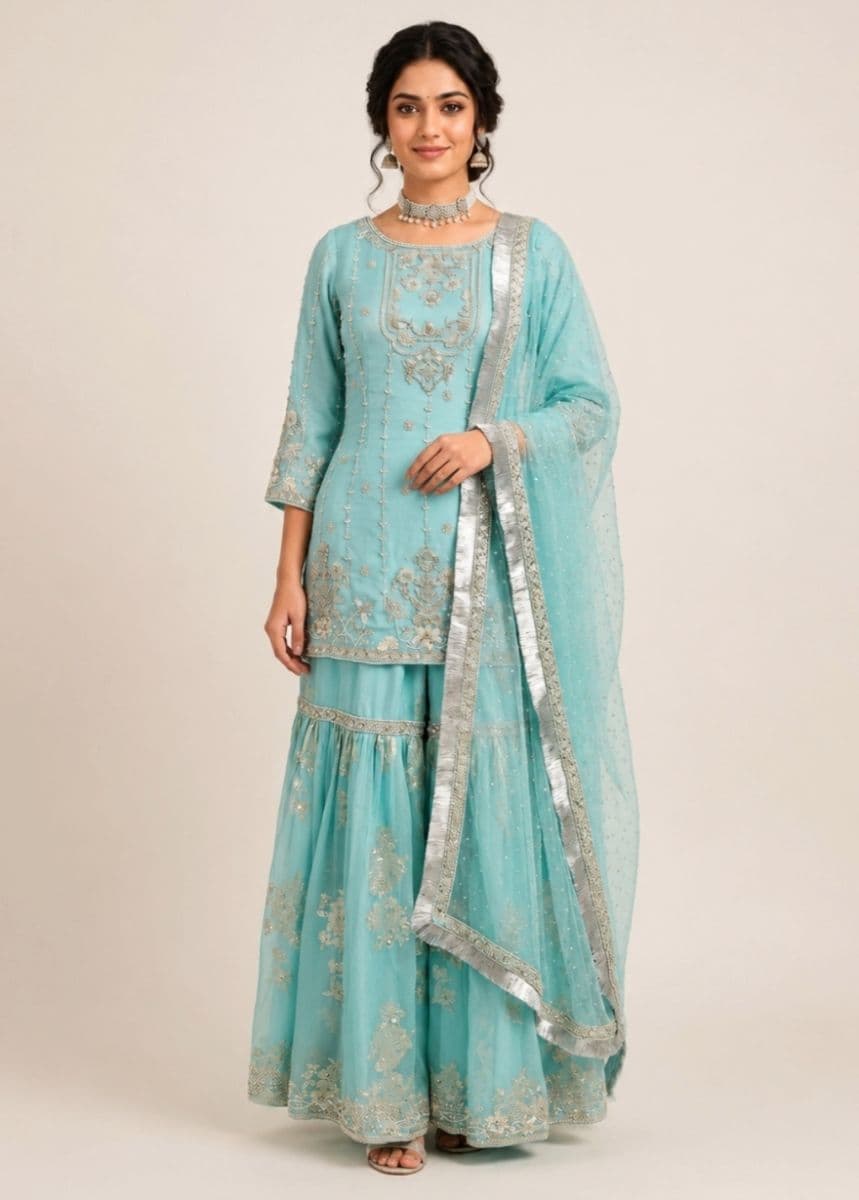 Luxury Ice Blue Hand Embroidered Sharara Set with Silver Zardozi Work & Embellished Net Dupatta